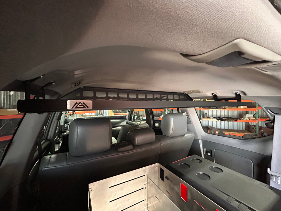 Car interior with a roof rack installed